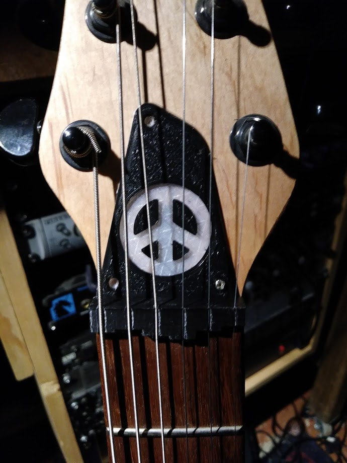 Truss rod cover plate for my custom guitar (also my design)